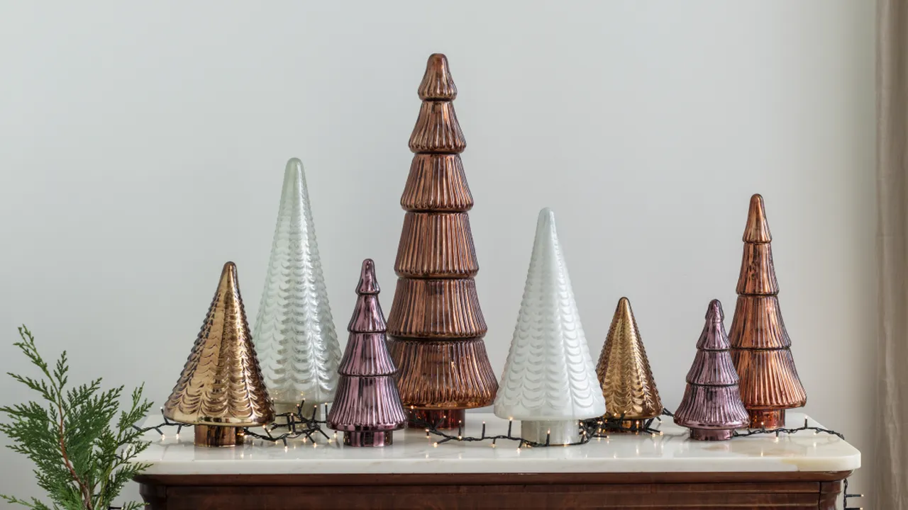 overhead view of corned beef sliced and on a platter with cabbage, potatoes, and carrots