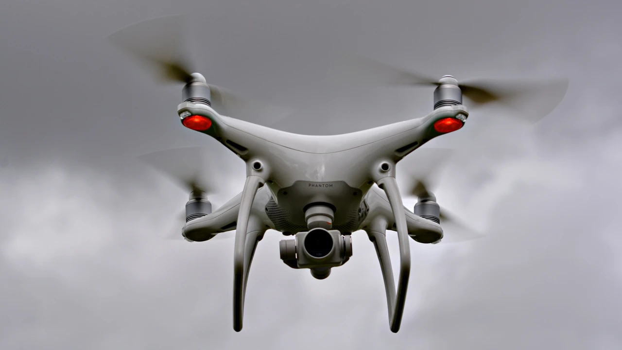 overhead view of corned beef sliced and on a platter with cabbage, potatoes, and carrots